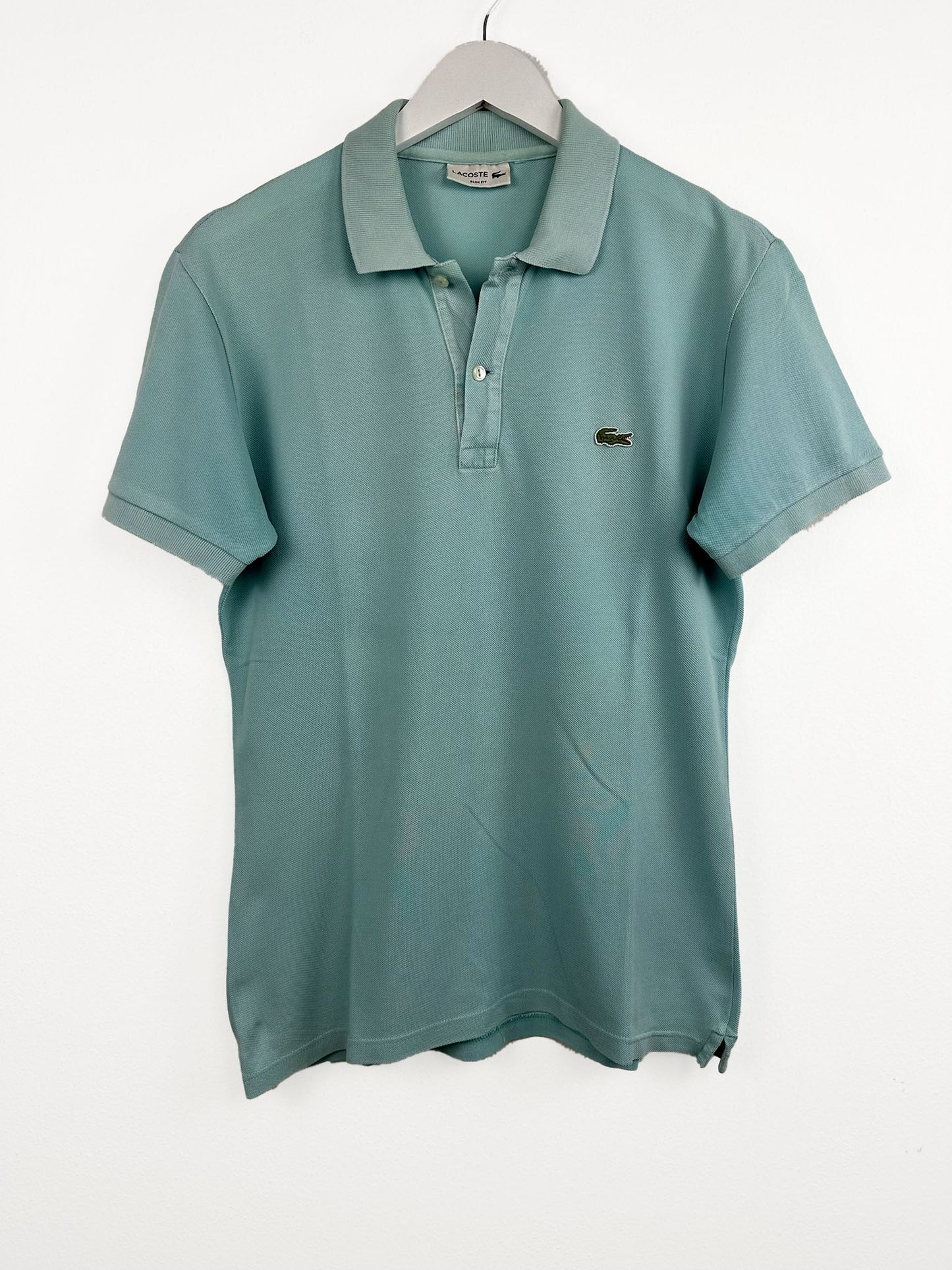 Polo Lacoste verde acqua (25p152) - M/L