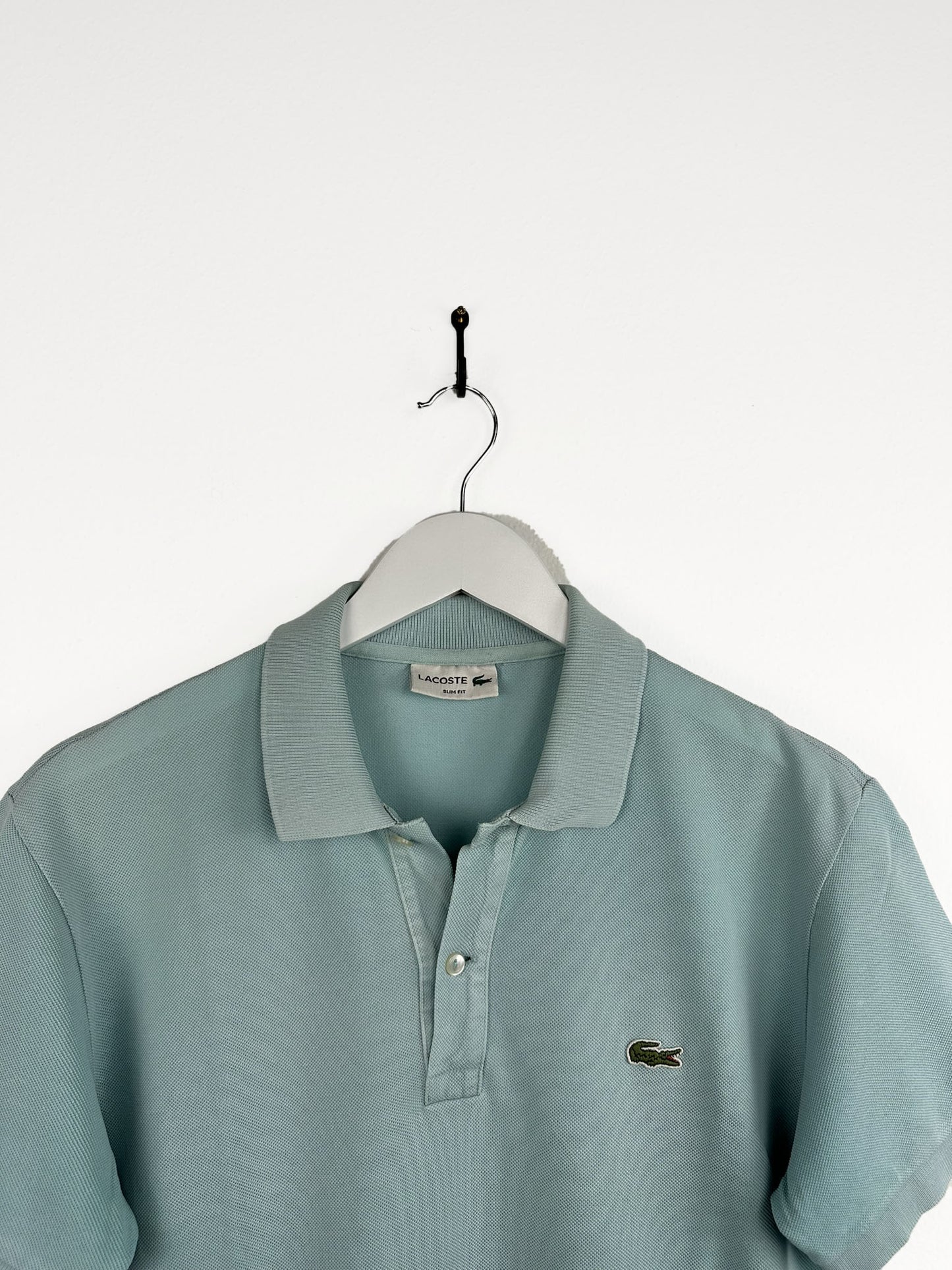 Polo Lacoste verde acqua (25p152) - M/L