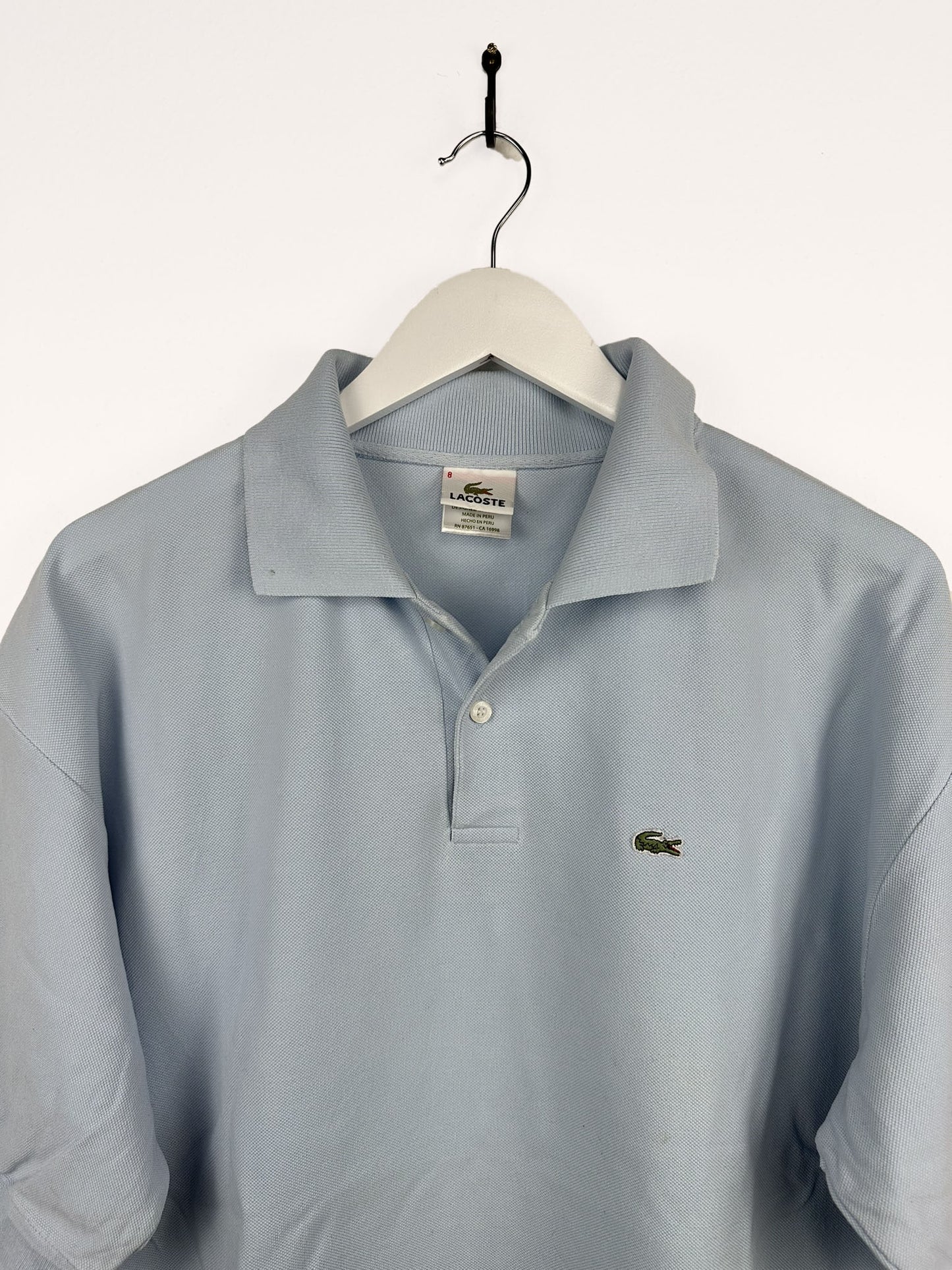 Polo Lacoste azzurra (25p23) - XL