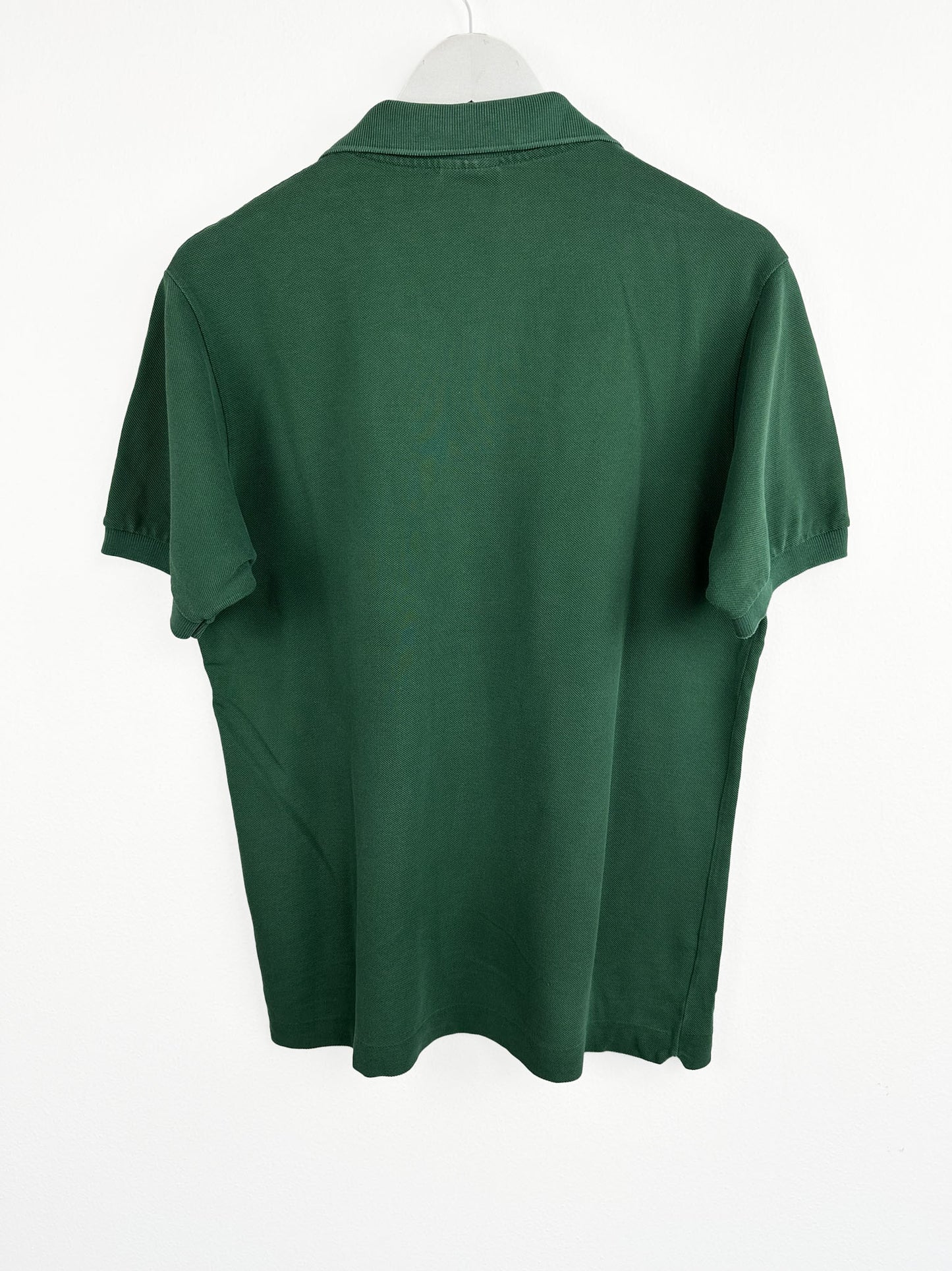 Polo Lacoste verde (25p69) - M