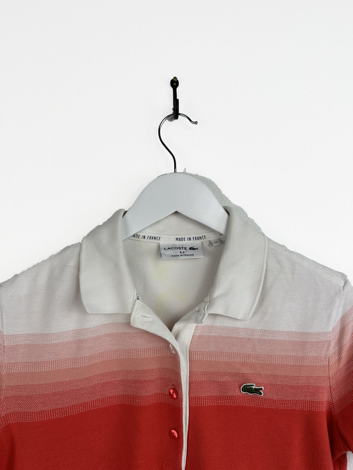 Polo Lacoste arancio donna (25p85) - XS