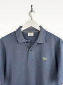 Polo Lacoste blu ottanio (25p145) - M