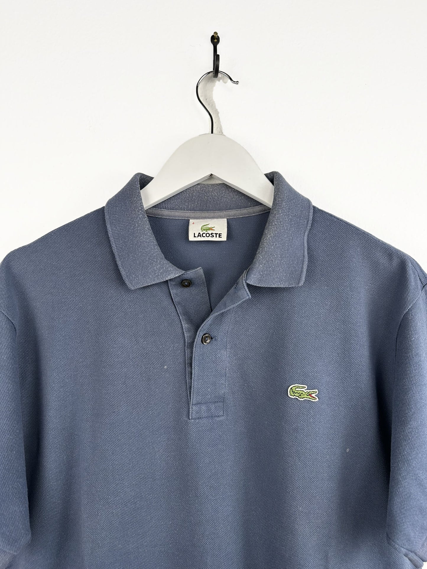 Polo Lacoste blu ottanio (25p145) - M