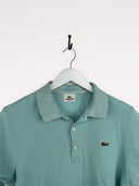 Polo Lacoste turchese donna (25p14) S