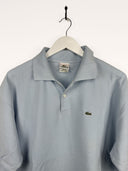 Polo Lacoste azzurra (25p23) - XL