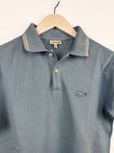 Polo Lacoste azzurra donna (25p26) - S