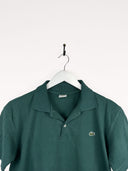 Polo Lacoste verde (25p30) - S