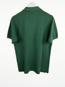 Polo Lacoste verde (25p69) - M
