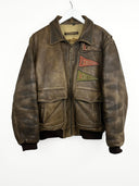 Giacca bomber in pelle Chevignon 90s marrone con patches (26g311) - L